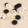 Mother of pearl button with 4 holes