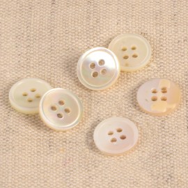 MOTHER OF PEARL BUTTON WITH 4 HOLES